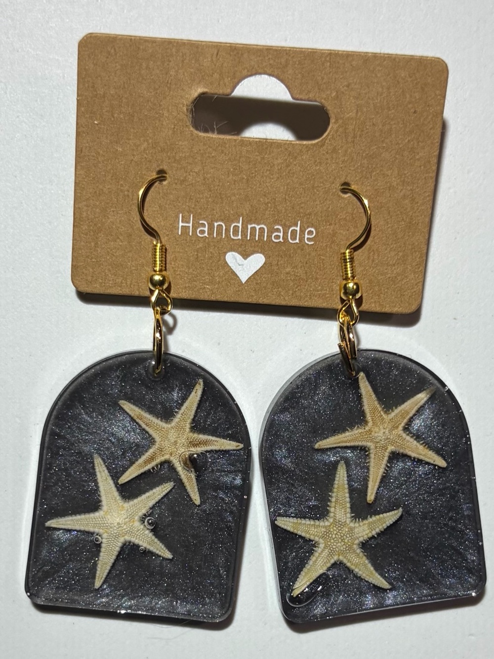 Black Starfish Arch Earrings